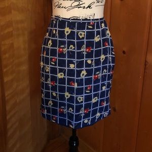 Harold’s blue rayon skirt with floral pattern.